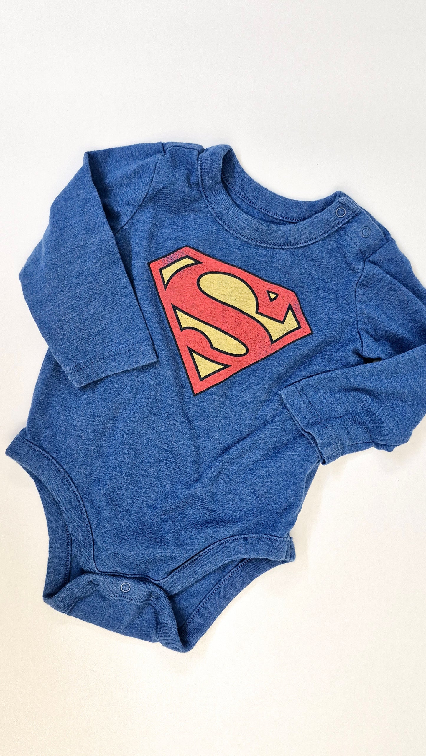 Cache Couche 6-12 mois Superman