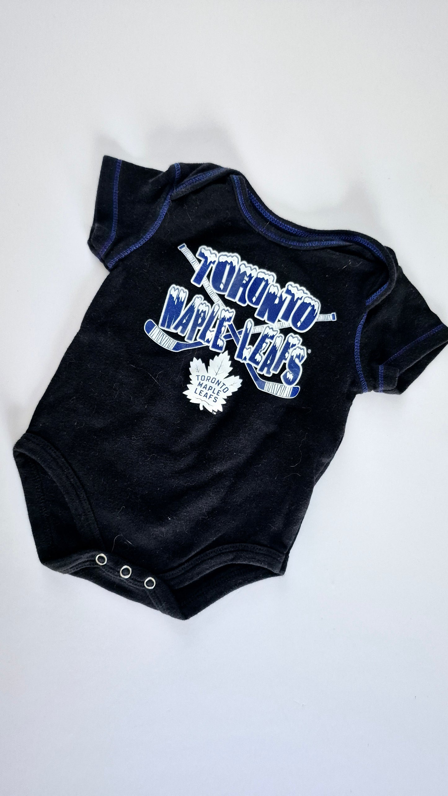 Cache Couche 6-9 mois NHL