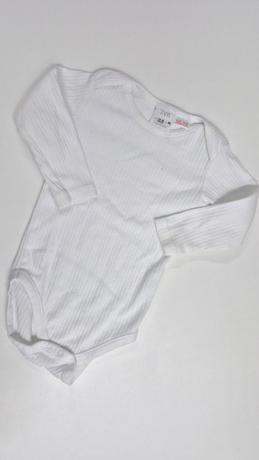 Cache Couche 12-18 mois Zara (imparfait léger bout des manches)